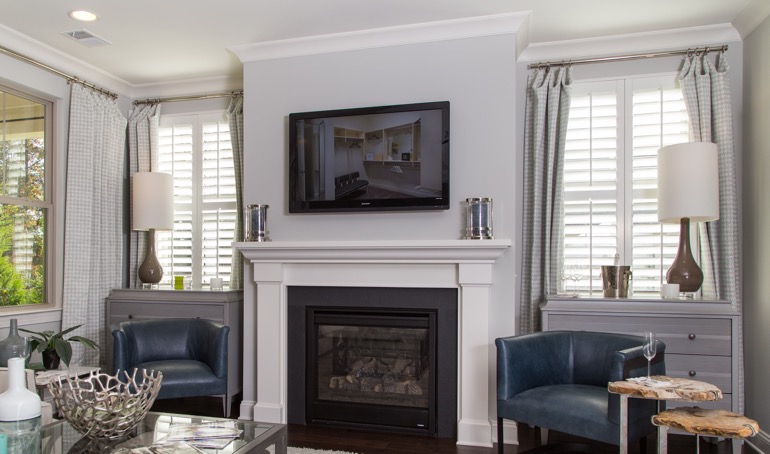 New Brunswick fireplace with plantation shutters.